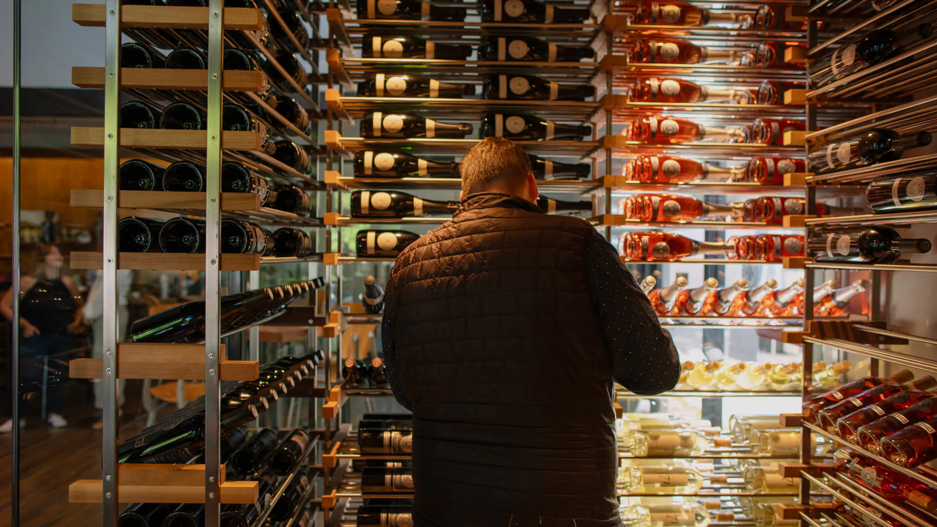 man in wine cellar