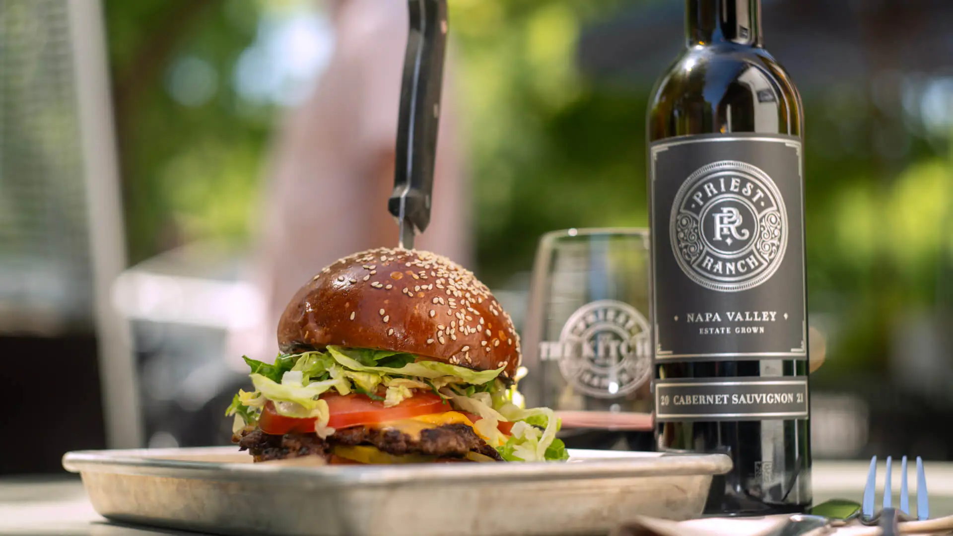 burger and wine bottle